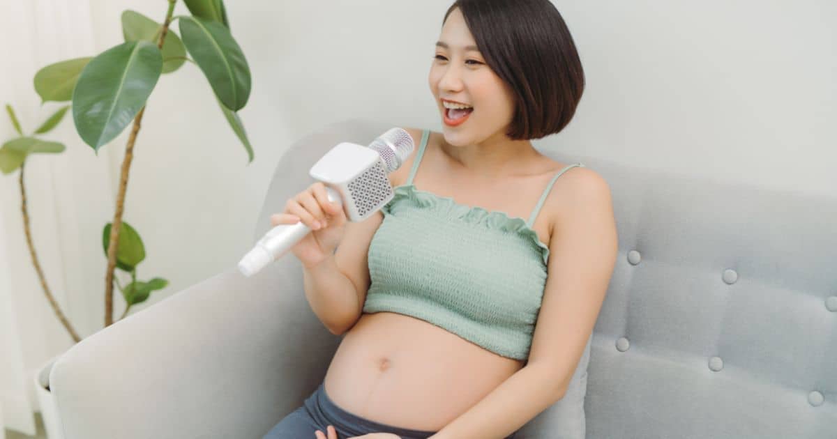 Pregnant woman singing in labor