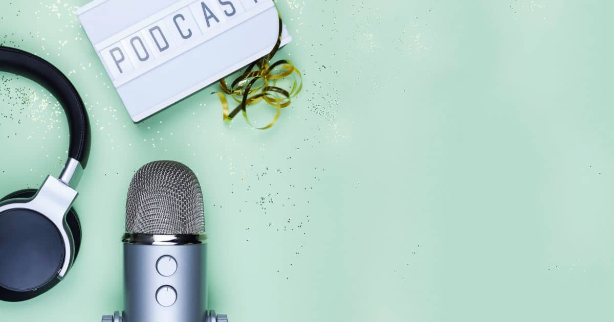 Microphone and message board on a green background...Sharon Muza podcasts on Birthful